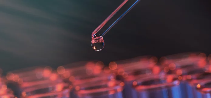  Pipette with liquid droplet in a laboratory for environmental simulation and pharmaceutical testing