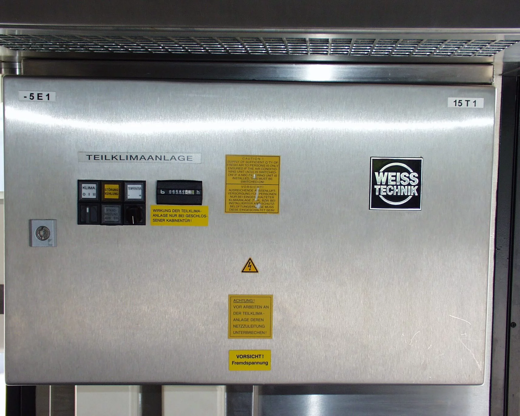  Front view of the K36W‑A climate module by Weiss Defence with stainless‑steel housing, control elements and warning labels