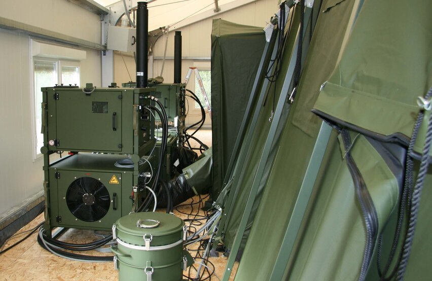 Installed ZKB MCRS1 tent climate system by Weiss Defence with modular units, air hoses and exhaust pipes