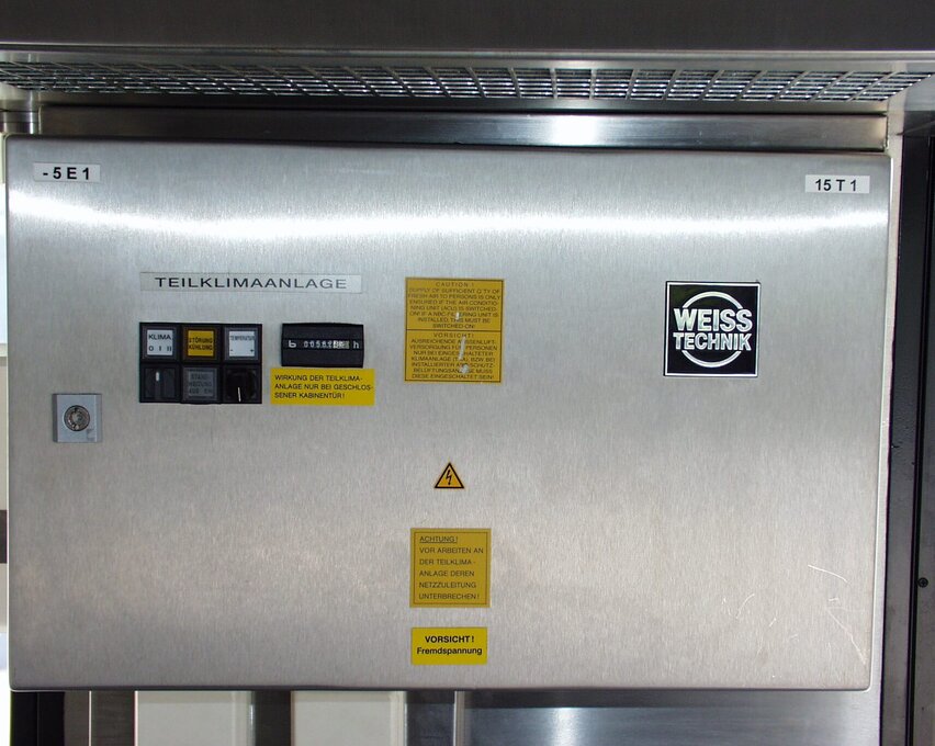  Front view of the K36W‑A climate module by Weiss Defence with stainless‑steel housing, control elements and warning labels