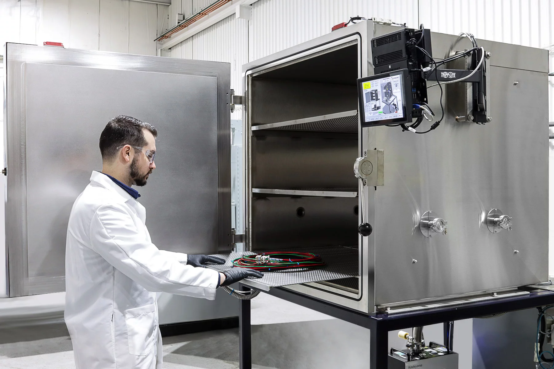  Industrial vacuum oven used for bakeout and thermal testing of components in a controlled laboratory environment